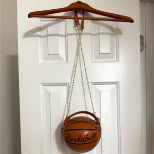 BROWN/ GOLD BASKETBALL BAG.